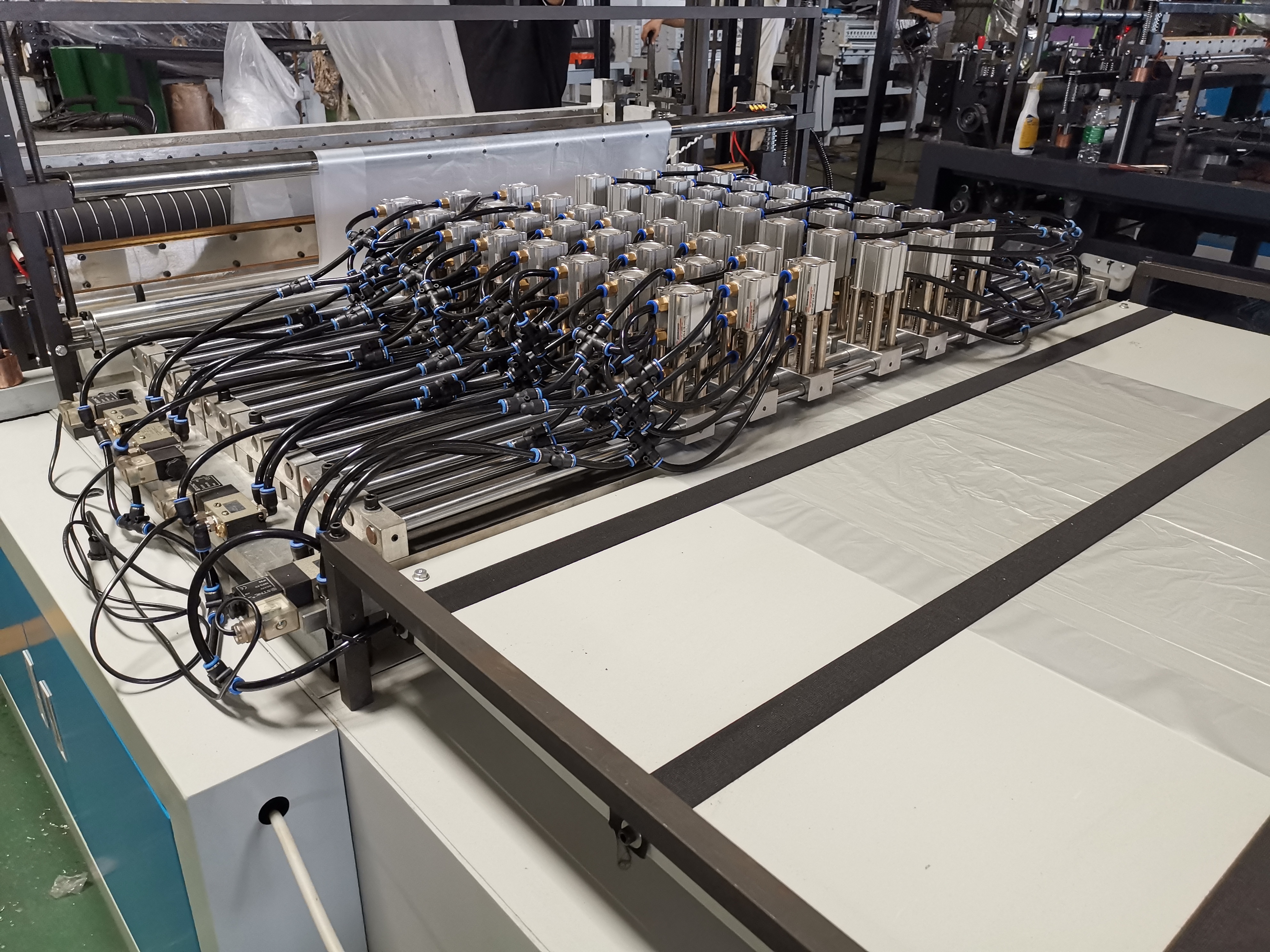 FULLY AUTOMATIC MULTI HOLE BOTTOM SEALING BAG MAKING MACHINE
